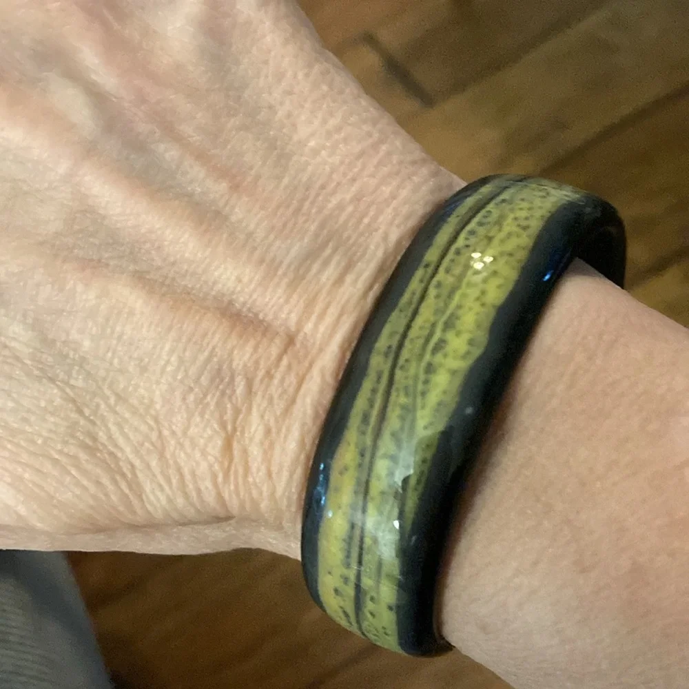 glass bangle bracelet black yellow abstract design